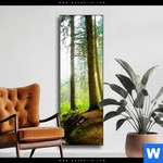 Wechselmotiv Idyllischer Wald Bei Sonnenaufgang Schmal Produktvorschau mit dem Bild Idyllischer Wald bei Sonnenaufgang im Format Schmal.