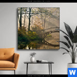 Wechselmotiv Idyllischer Wald Mit Bruecke Quadrat Produktvorschau mit dem Bild Idyllischer Wald mit Brücke im Format Quadrat.