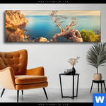 Wechselmotiv Kuestenlandschaft Mit Altem Baum Panorama Produktvorschau mit dem Bild Küstenlandschaft mit altem Baum im Format Panorama.