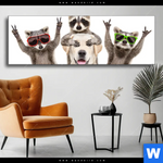 Wechselmotiv Lustige Waschbaeren Mit Hund Panorama Produktvorschau mit dem Bild Lustige Waschbären mit Hund im Format Panorama.