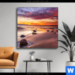 Wechselmotiv Sonnenuntergang Am Strand Mit Felsen Quadrat Produktvorschau mit dem Bild Sonnenuntergang am Strand mit Felsen im Format Quadrat.