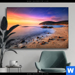 Wechselmotiv Sonnenuntergang In Bucht Querformat Produktvorschau mit dem Bild Sonnenuntergang in Bucht im Format Querformat.