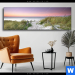 Wechselmotiv Strandweg Im Sonnenuntergang Panorama Produktvorschau mit dem Bild Strandweg im Sonnenuntergang im Format Panorama.