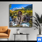 Wechselmotiv Waldhuette Am Fluss Quadrat Produktvorschau mit dem Bild Waldhütte am Fluss im Format Quadrat.