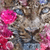 Spannbild Leopard & Blumen Hochformat Zoom wandbild.com