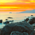Wechselmotiv Sonnenuntergang über dem Meer Hochformat Zoom wandbild.com
