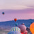 Spannbild Hei&szlig;luftballons im Sonnenuntergang Panorama Wandbild 3